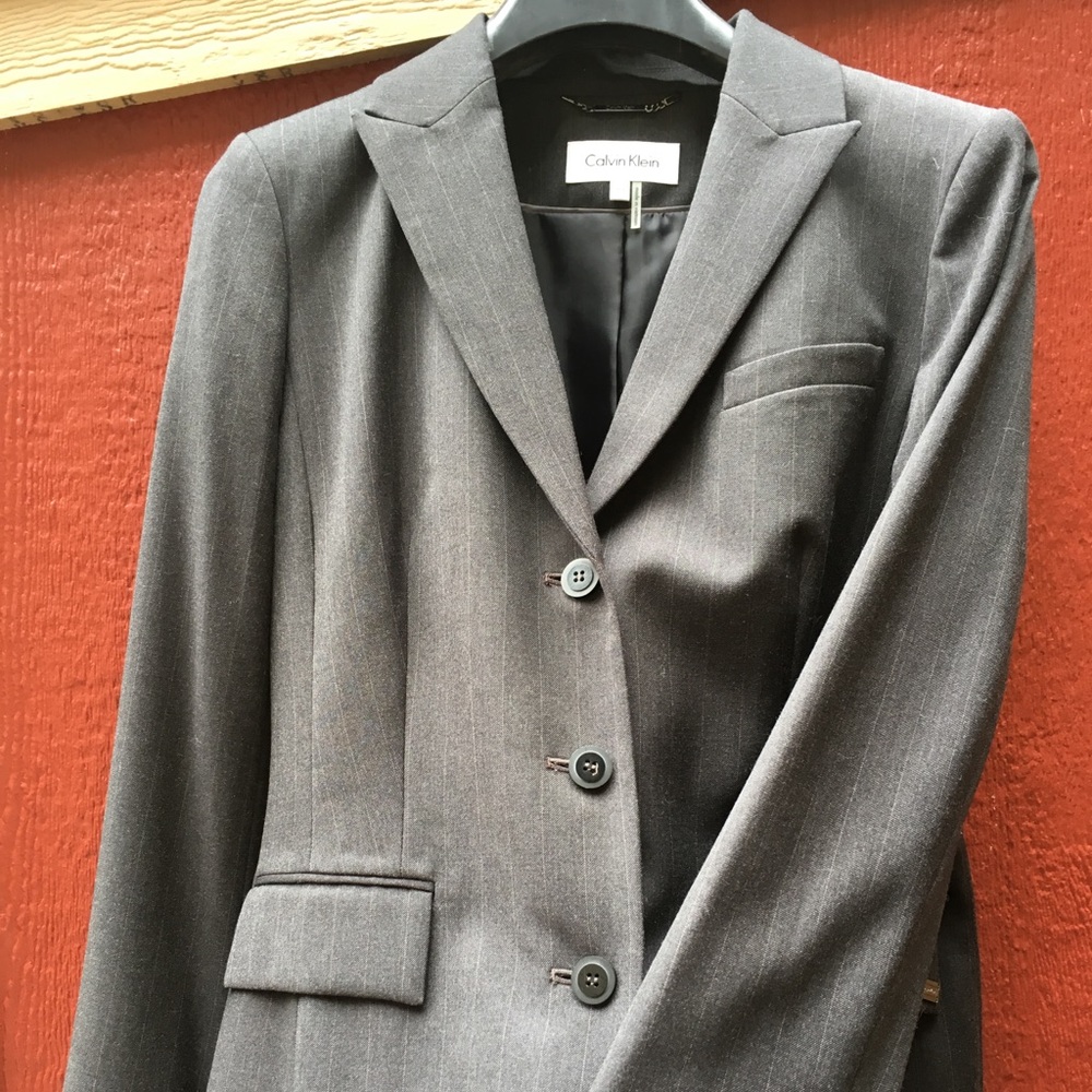 2 piece suit, jacket and skirt.